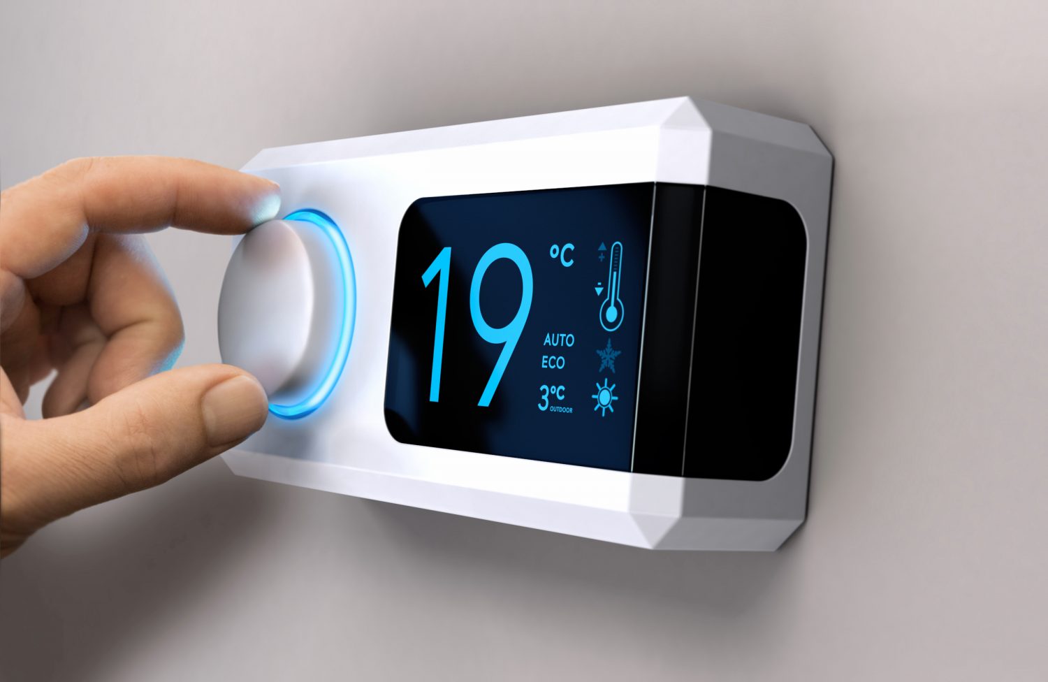 Heizungsthermostat an der Wand wird digital eingestellt